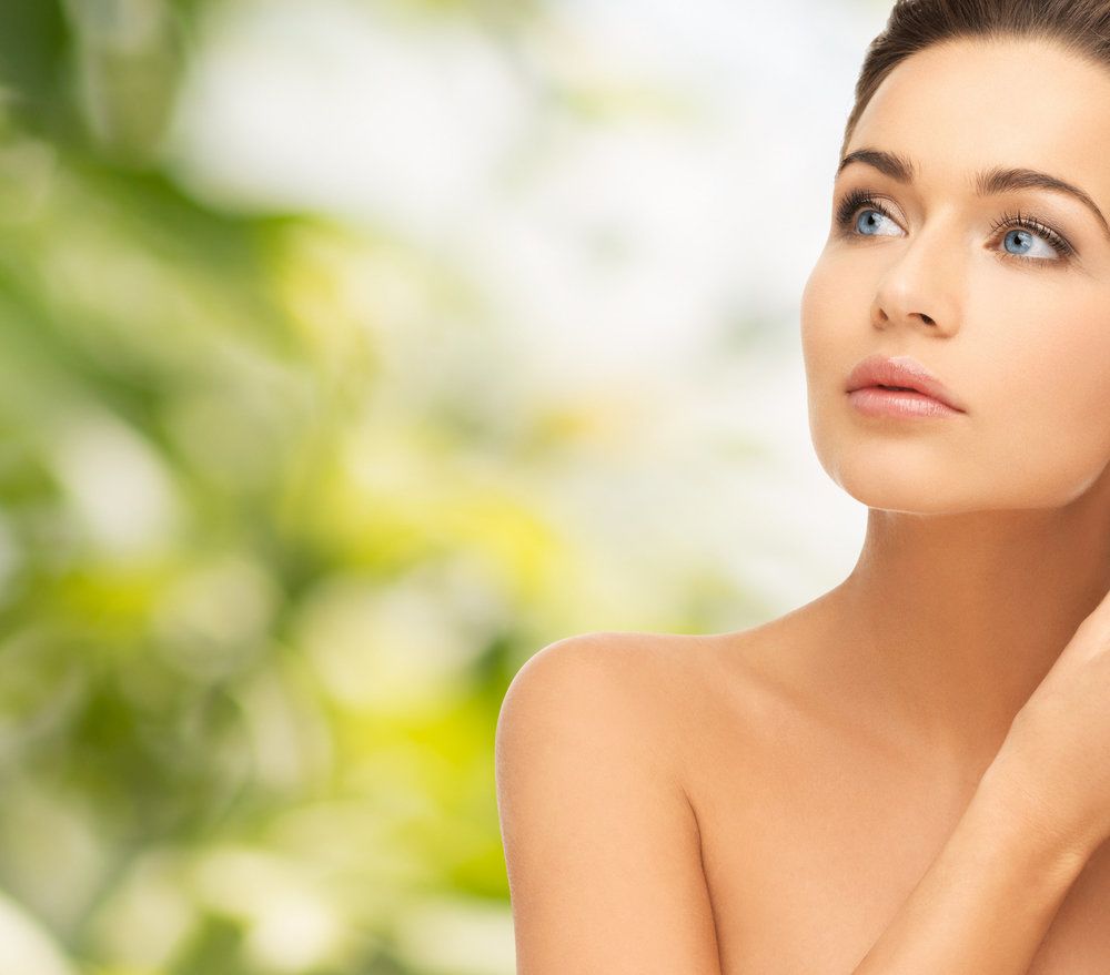 Portrait of brunette woman with radiant skin